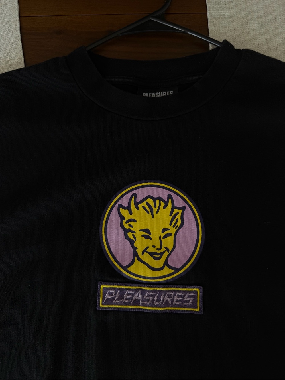 Pleasures Men’s Black Short Sleeve Tee with Yellow & Pink Logo